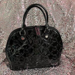 Hello Kitty patent leather embossed satchel.